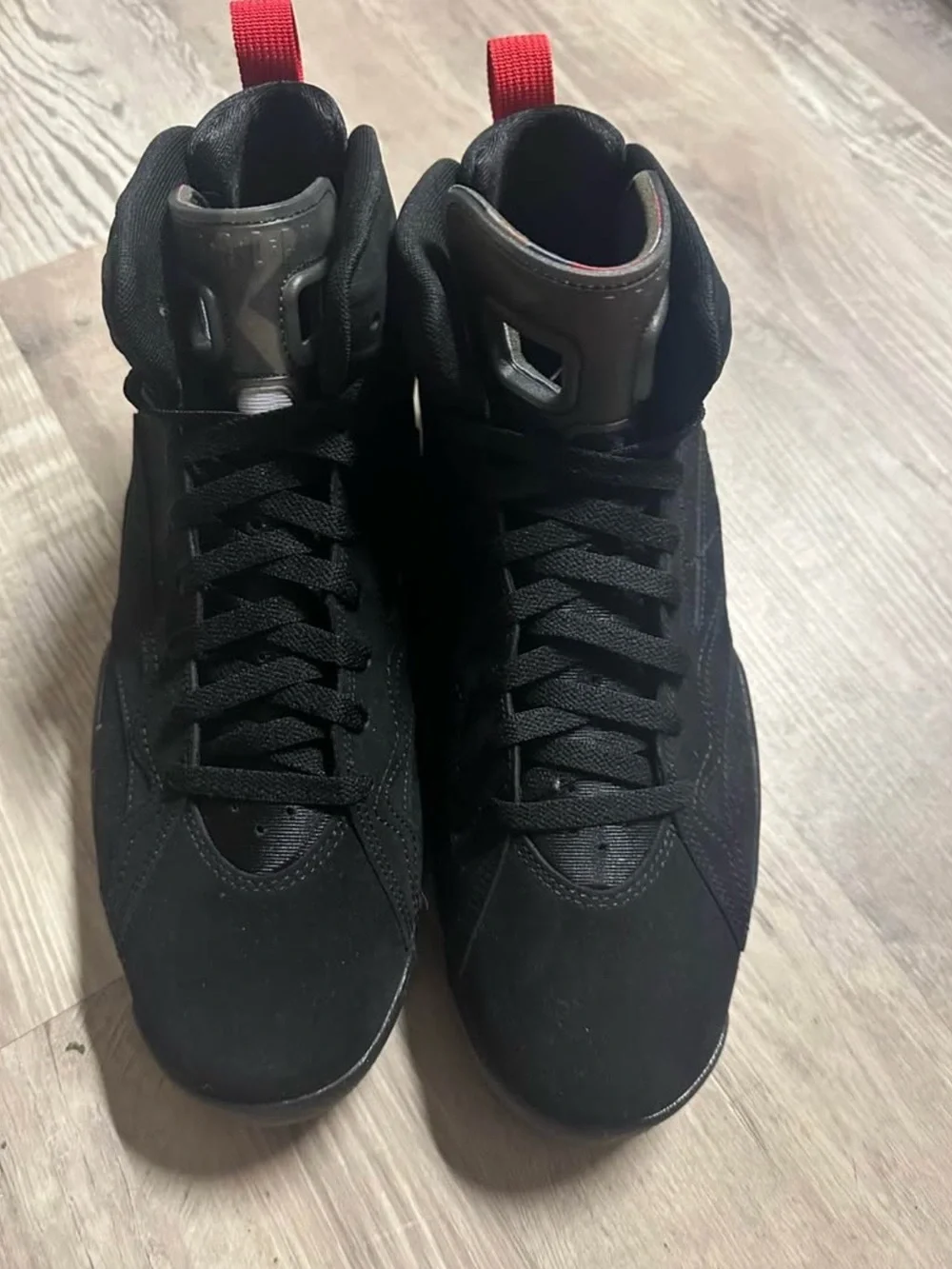 Jordan Black High-Top Sneakers with Red Heel Pull